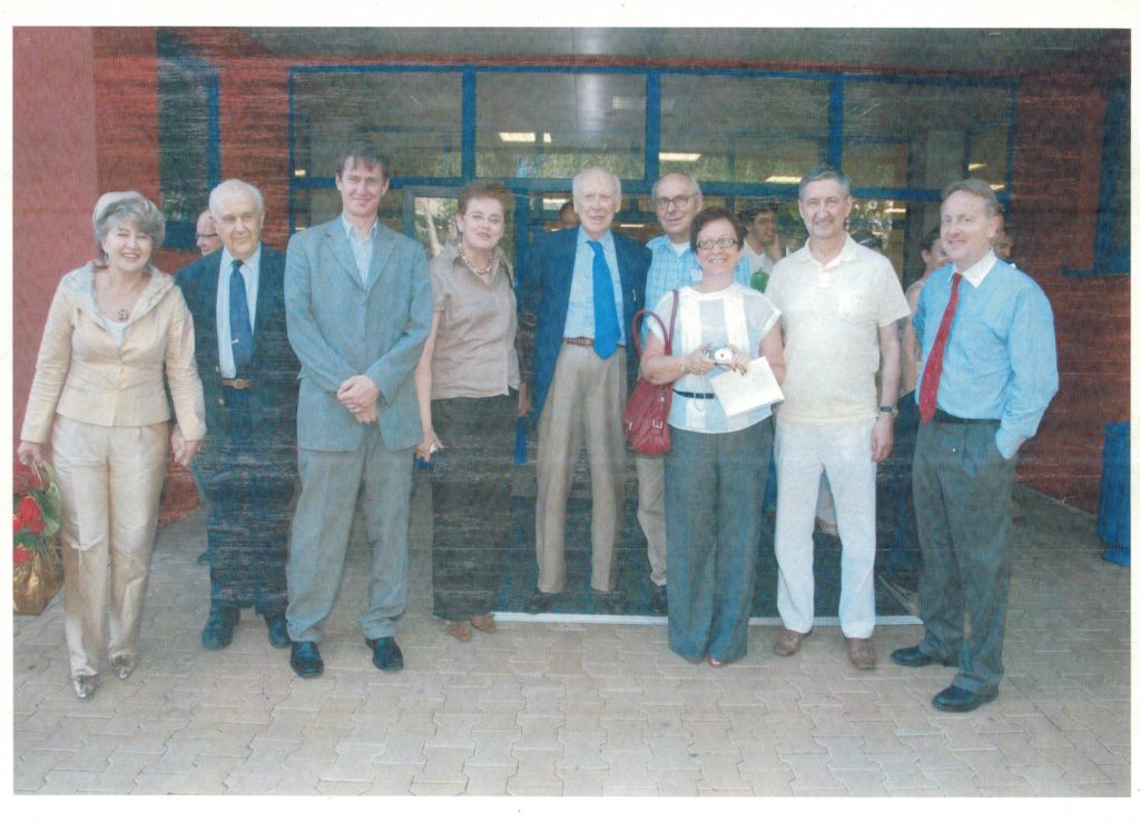 A group of smiling people in the photo