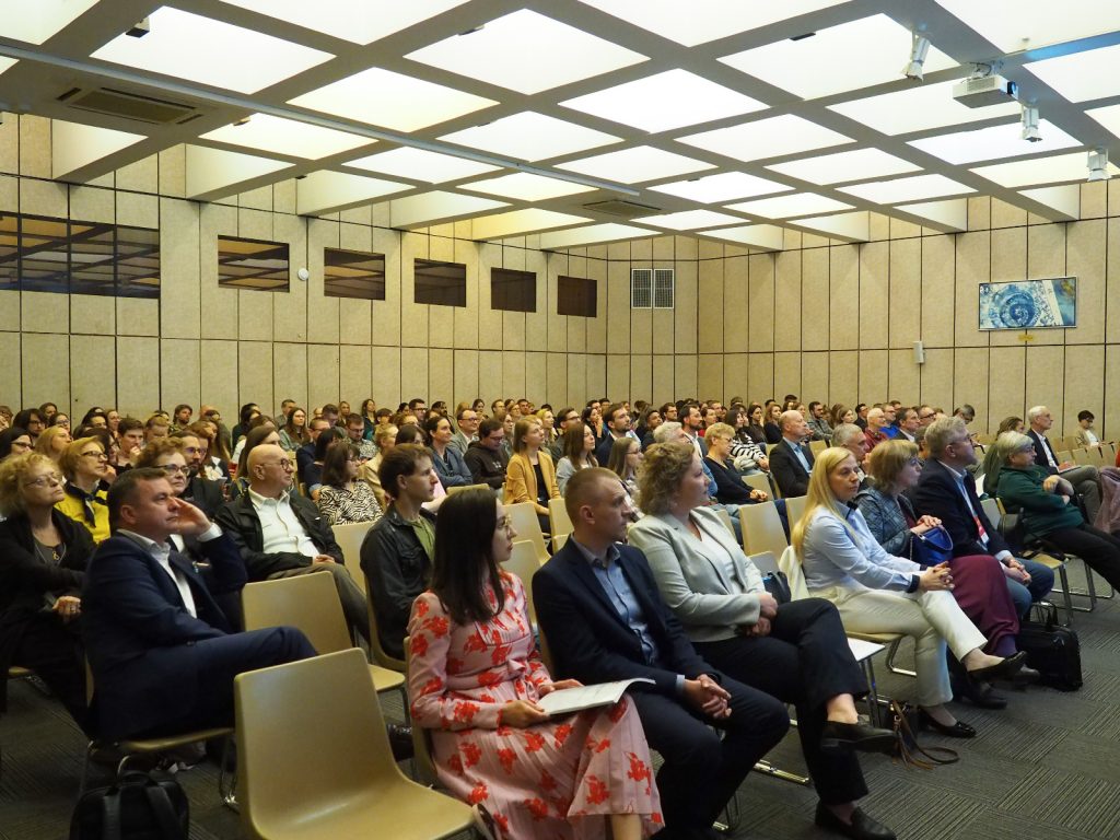IBCH PAS staff sitting in the hall during the speech