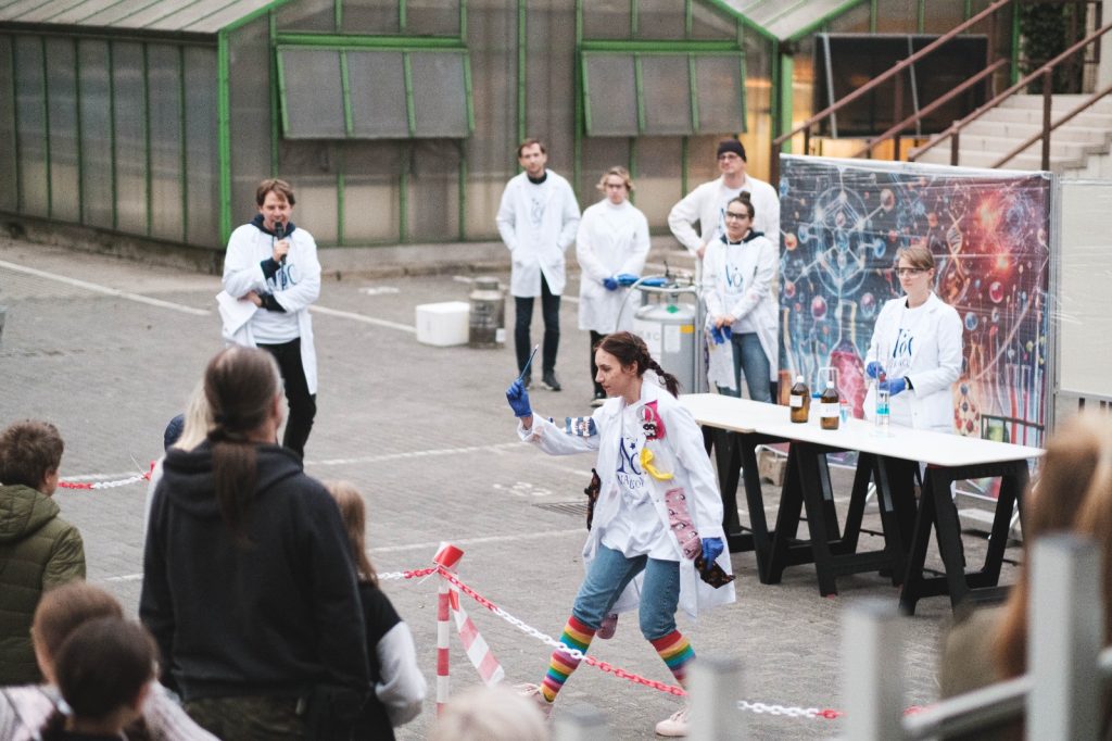 Scientists during a demonstration in the parking lot of the IBCH PAS.