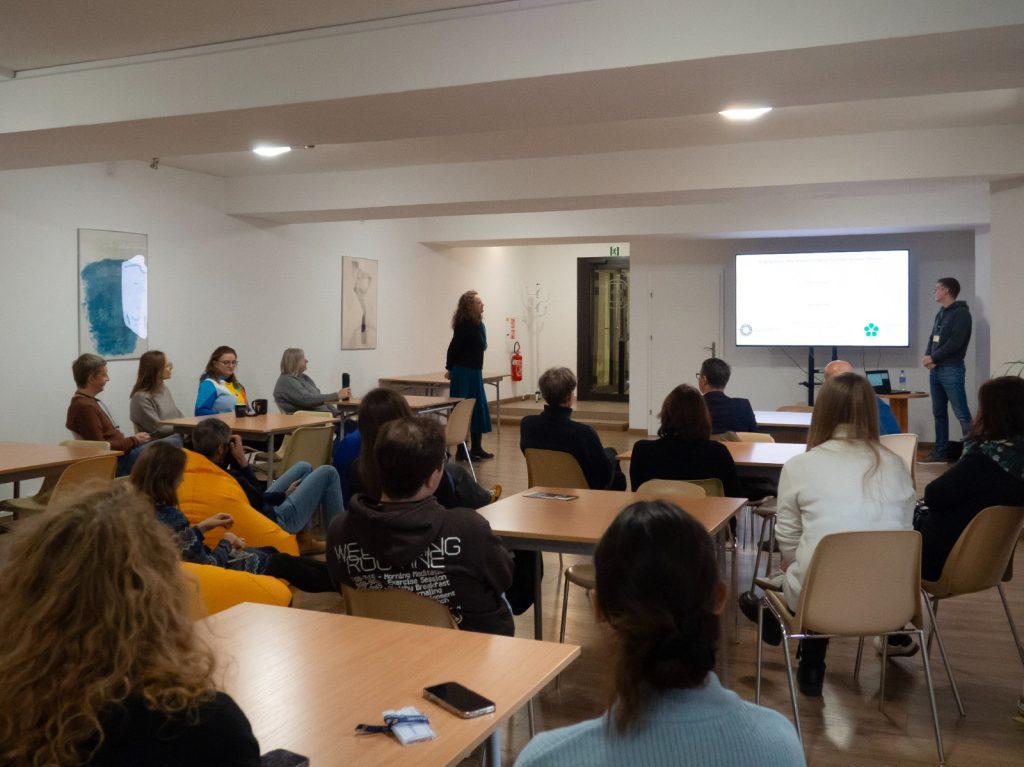 A group of scientists listening to a seminar
