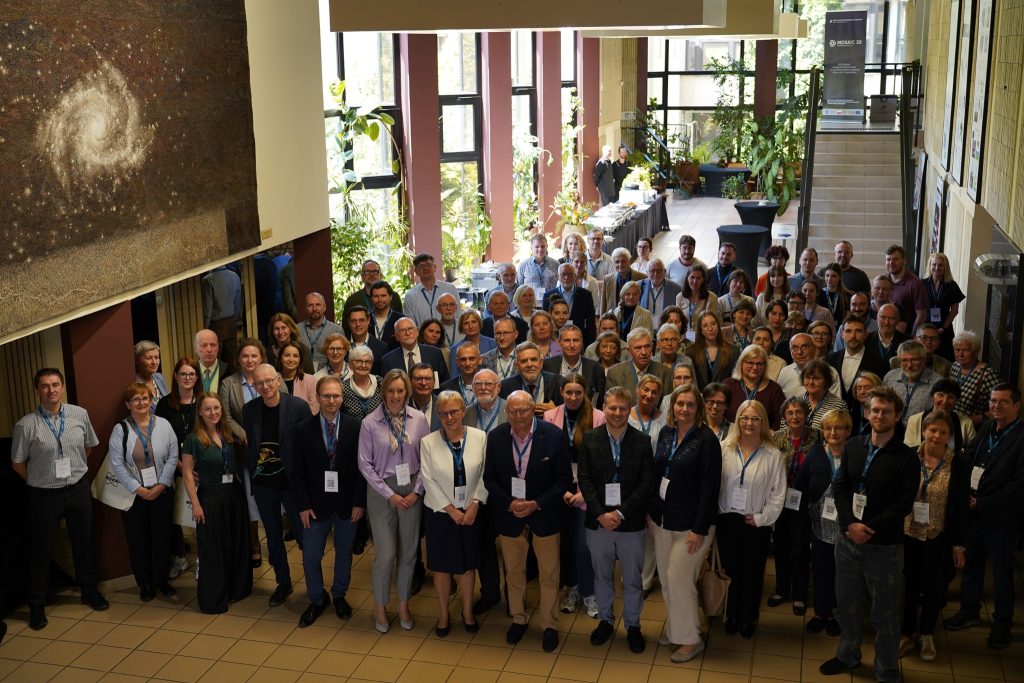 Group photo of the conference participants in the Institute lobby. Prof. Zofia Gdaniec is standing in the center